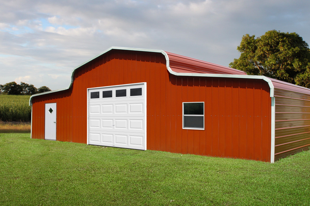 Custom steel metal garage with two lean-to's.